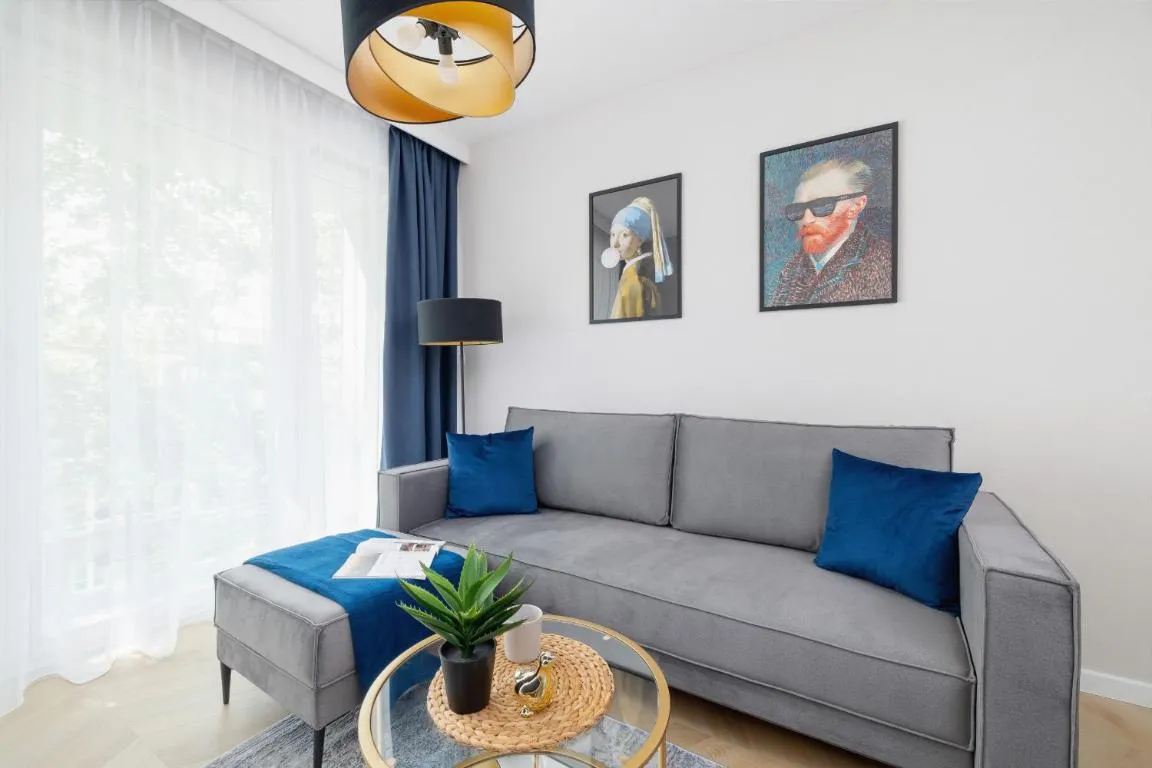 Image of Klimatyzowany Apartament w Centrum Krakowa z Parkingiem i Biurkiem by Renters Prestige