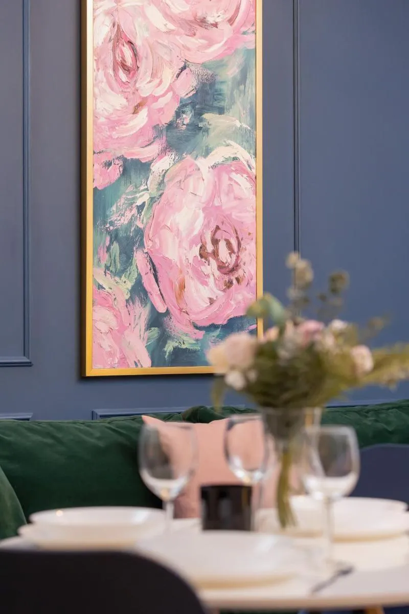 Image 3 of Blue and Green Apartment with Bright Pink Bedroom in Kraków by Noclegi Renters