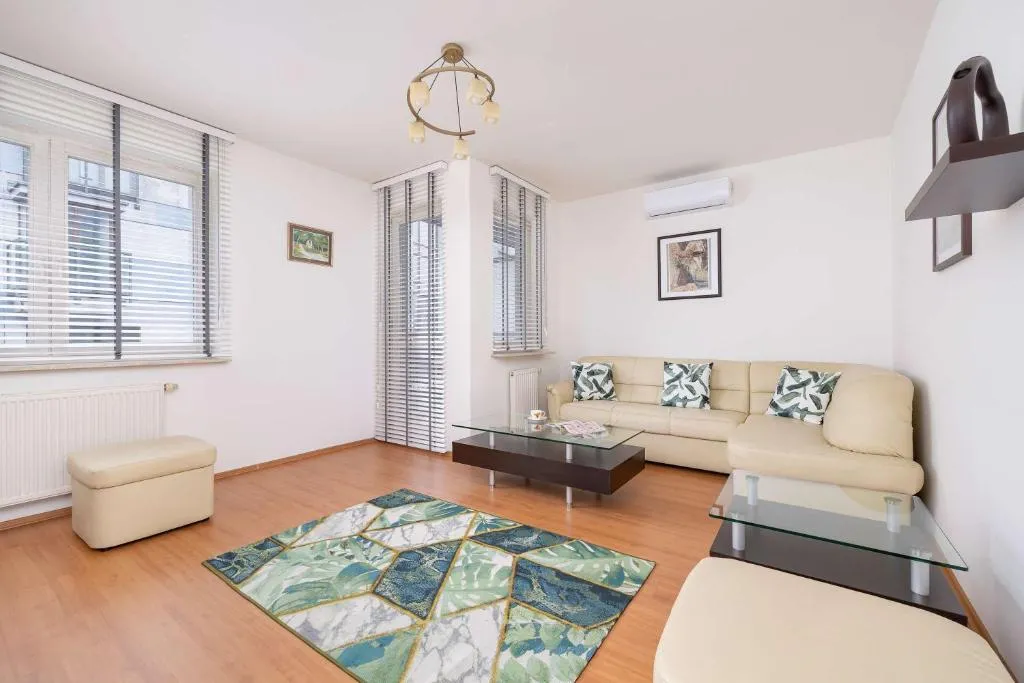 Image of Bright Apartment near ICE Kraków with Air Conditioning and Parking by Noclegi Renters
