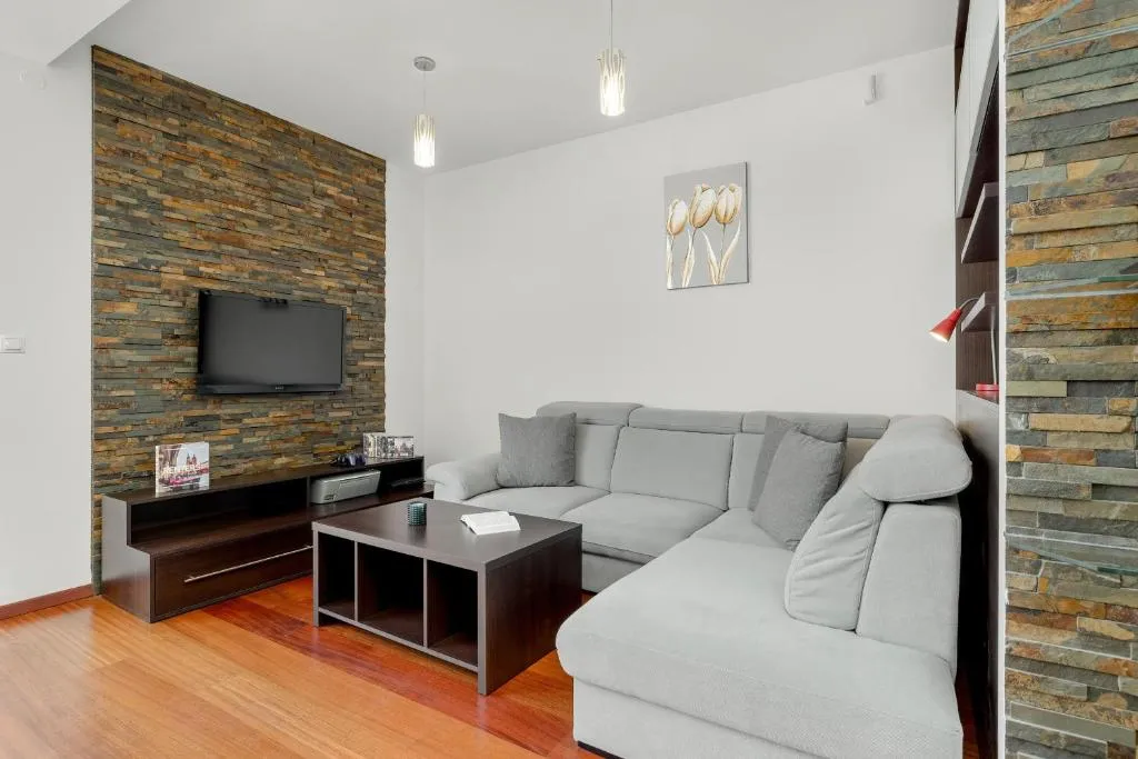 Image of Gamers’ Paradise – Modern Apartment with Parking in Cracow by Noclegi Renters