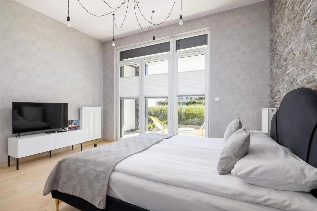 Image of Kraków Studio with Parking & Terrace near Zalew Bagry by Renters Prestige