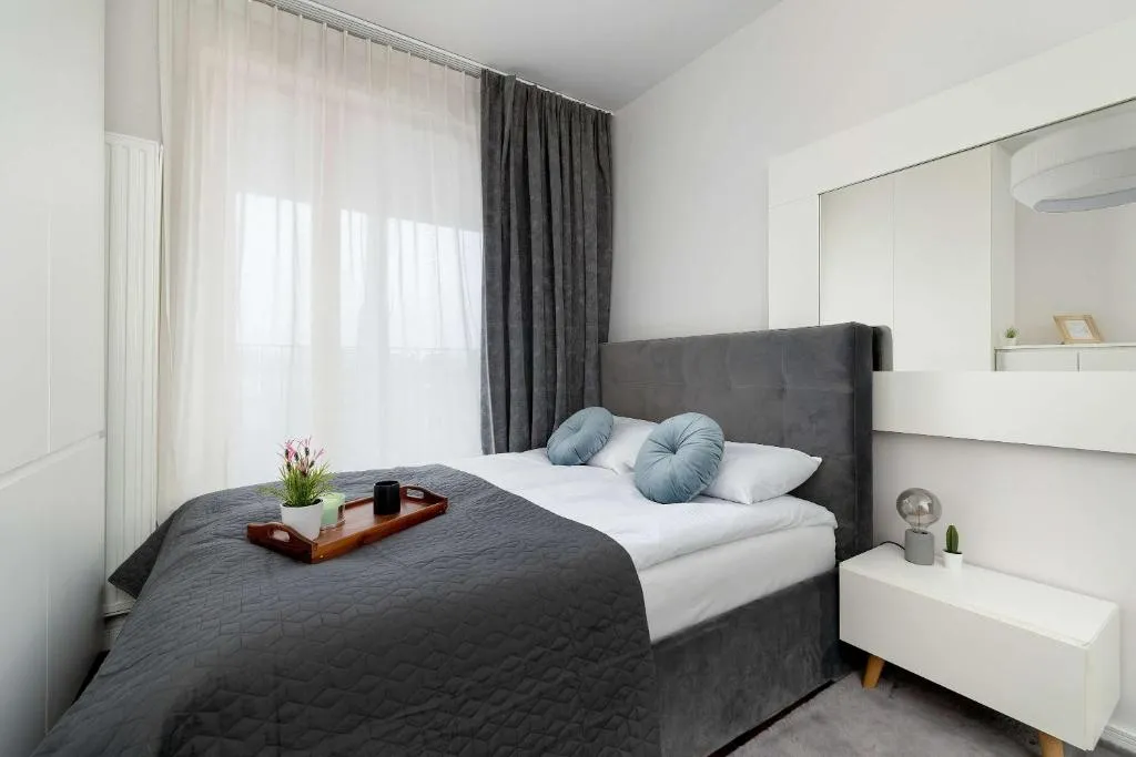 Image of Lubicz Stylish Apartment with Parking and Air Conditioning in the City Center by Noclegi Renters