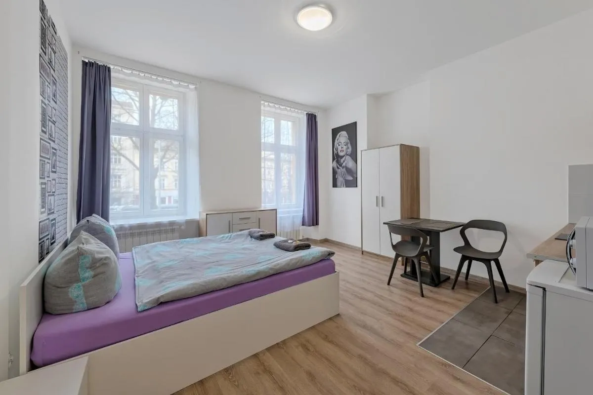 Image 6 of Queen Apartments