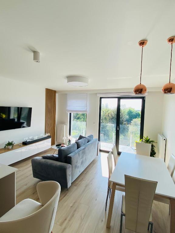 Image of Luxury White Apartment in Park Lotników